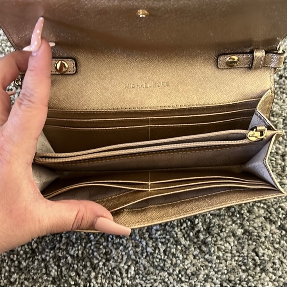 Micheal Kors gold clutch wallet/ purse